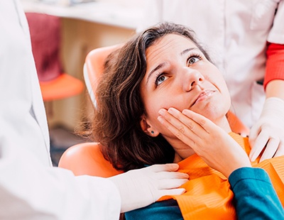  Woman at the dentist with a toothache